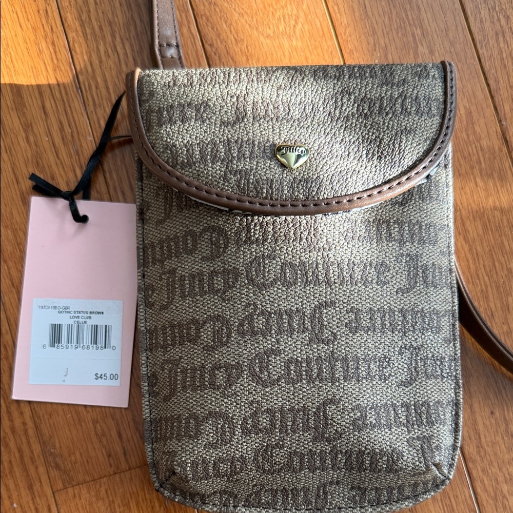 On sale today!
Juicy Couture Brown Monogram Crossbody Bag